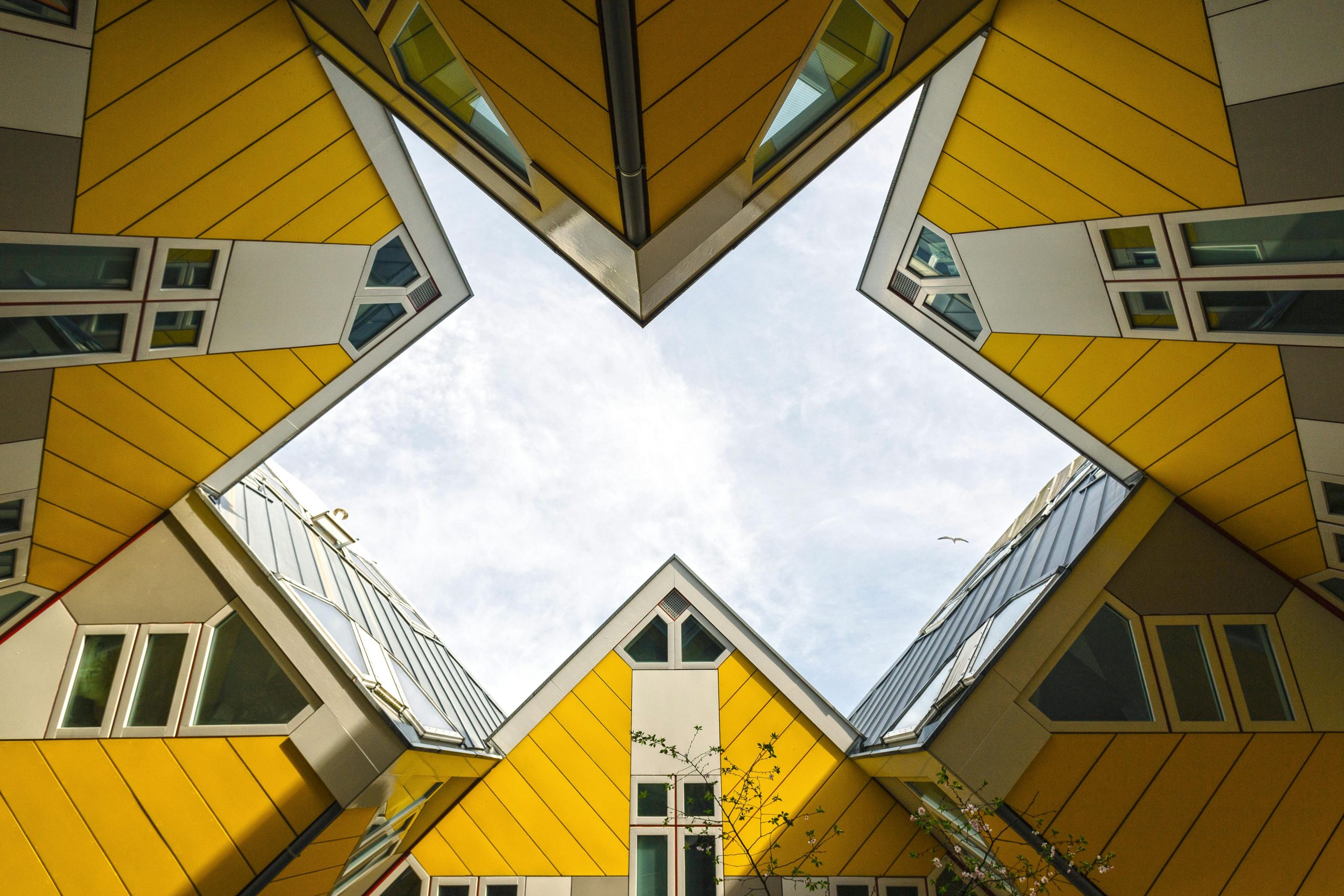 Low angle view of the iconic Cube Houses in Rotterdam, showcasing modern architectural design.